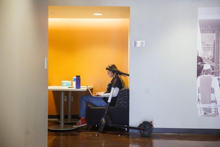 a student studies in a skandera hall study nook